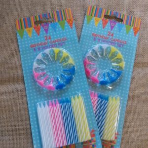 packet of 24 multicoloured candles with 12 re-useable candle holders